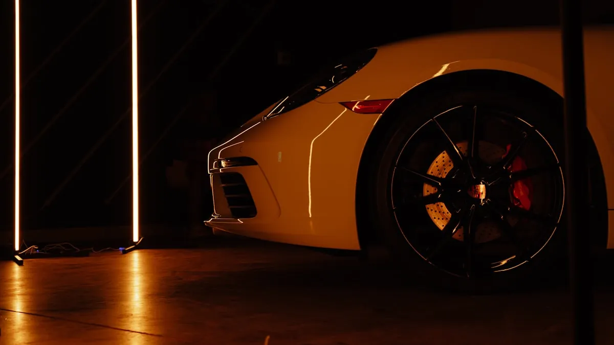 Side-by-side comparison of clear gloss and matte satin PPF finish on a vehicle panel