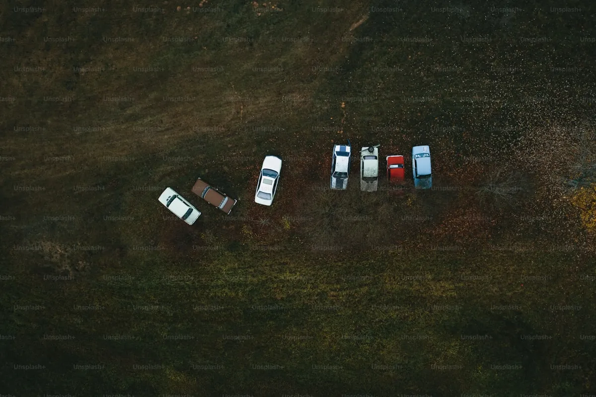 Porsche 911 receiving paint protection film application in a professional shop